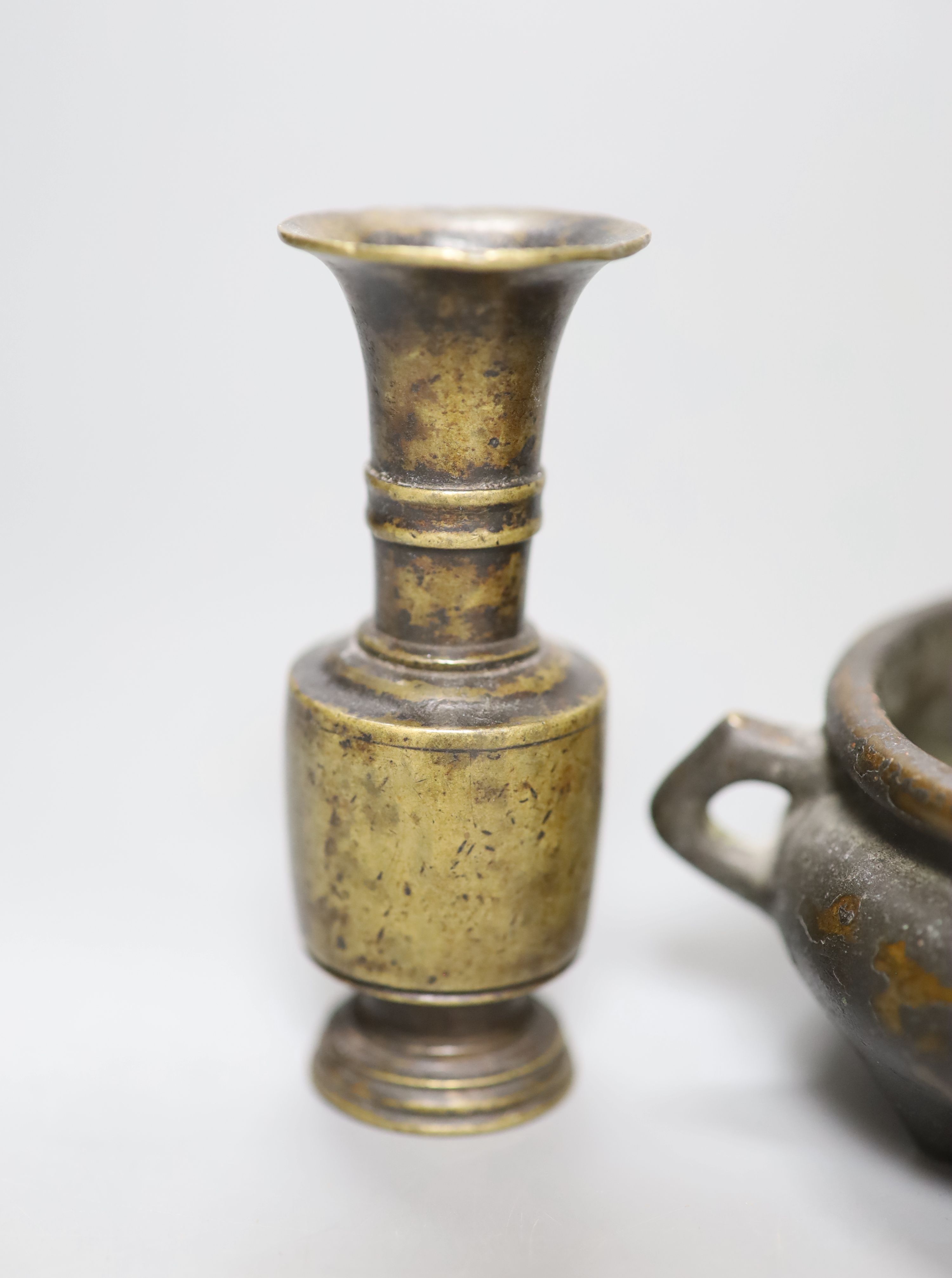 A Chinese late Ming bronze miniature vase, a modern censer and a Japanese elephant censer with boy cover, c.1900, tallest 10cm